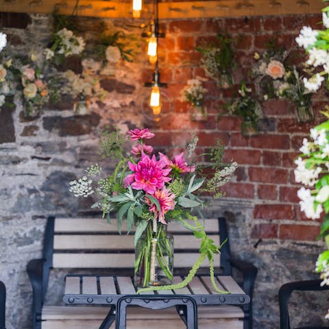 Celebrate the unique charm of this Cornish setting from the garden