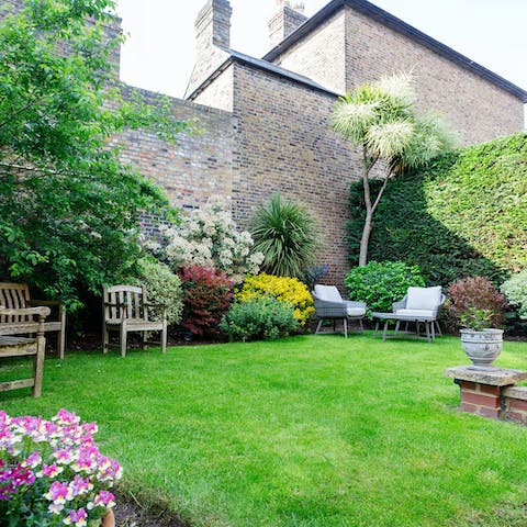 Sip a glass of Pimm's in the beautiful garden after a busy afternoon