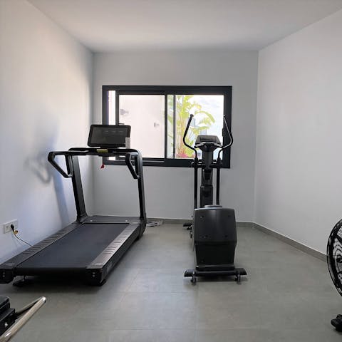 Stay on top of your fitness routine with a workout in the on-site gym