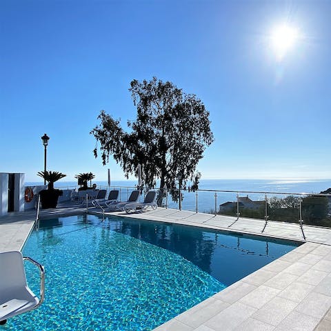 Soak up the Spanish sun from in or beside the communal pool