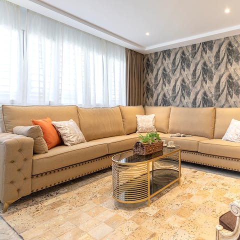 Gather on your elegant corner sofa to reminisce over your day