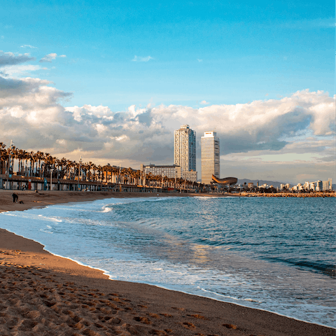 Spend the day building sandcastles at Bogatell Beach, just a sixteen–minute drive away