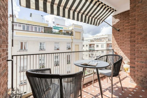 Sit out with a glass of wine above Madrid