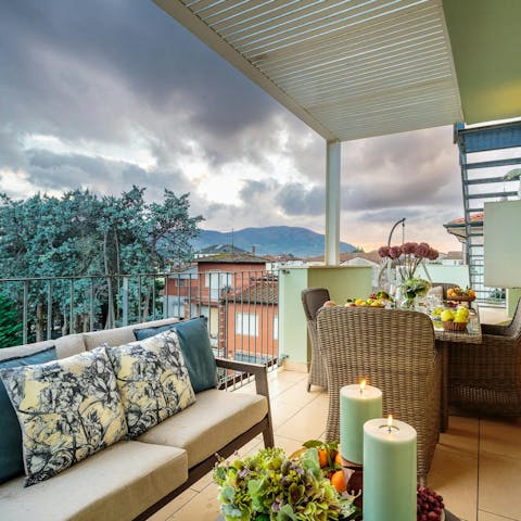Unwind on your private terrace with city views
