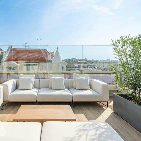 Take in the stunning views of the city from the private terrace