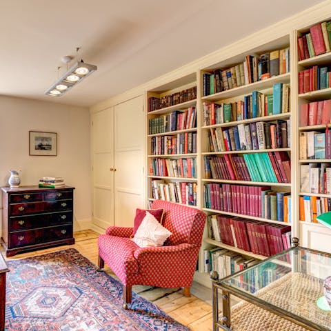 Drift off to sleep in the library-like master bedroom