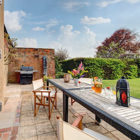 Indulge in a long, lazy lunch on the patio overlooking the gardens