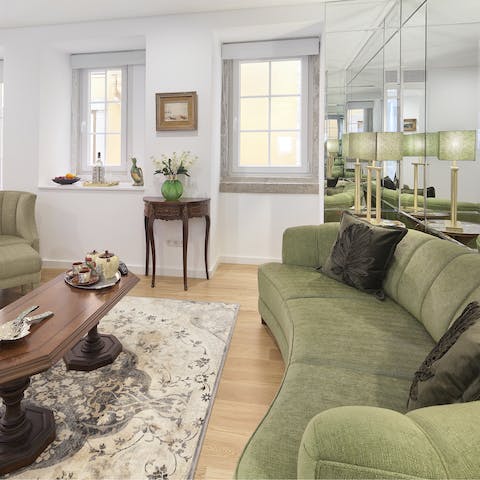 Sit back and relax on the sofa as you admire the furnishing that draw inspiration from Portuguese designers