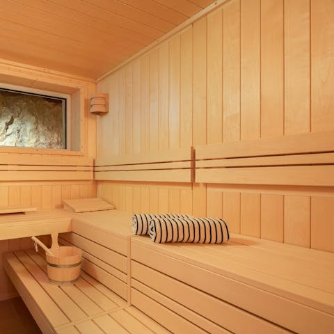 Unwind body and mind in the private sauna