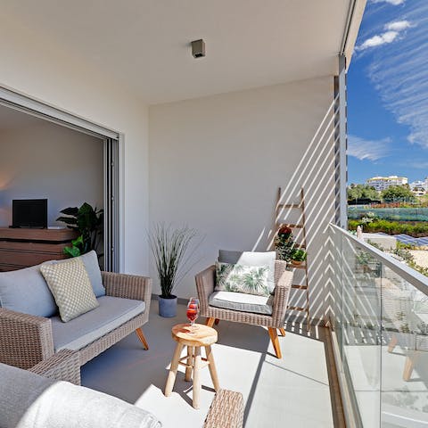 Relax and enjoy a cool drink in the warm sunshine of your private balcony