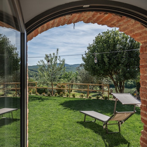 Soak up the countryside views on the sun loungers