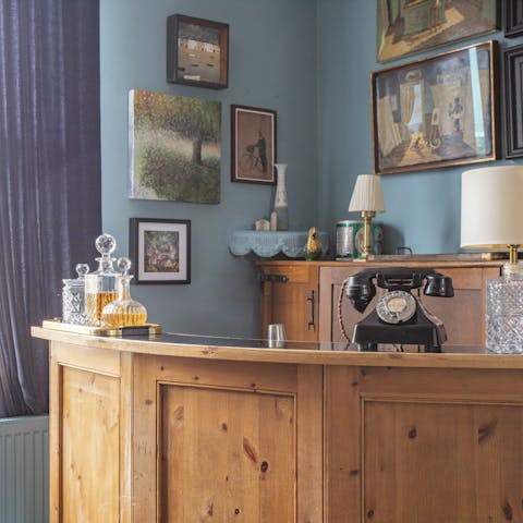Spend evenings gathered around the bar for homemade cocktails