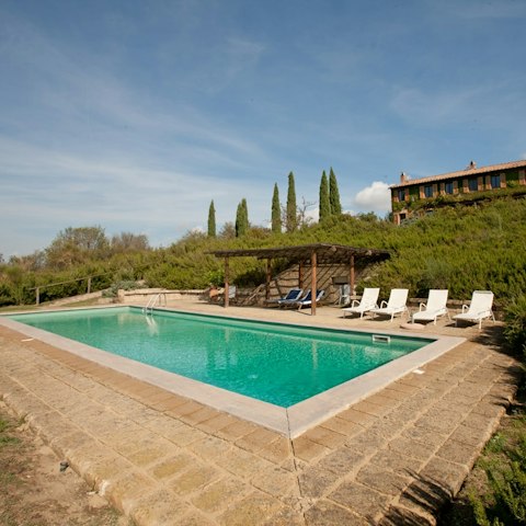 Soak up the sun beside the private pool