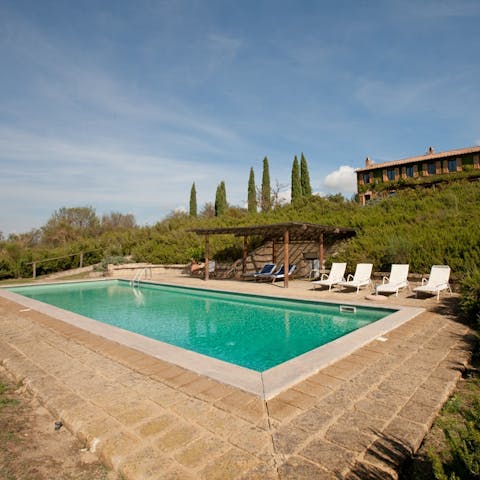 Soak up the sun beside the private pool
