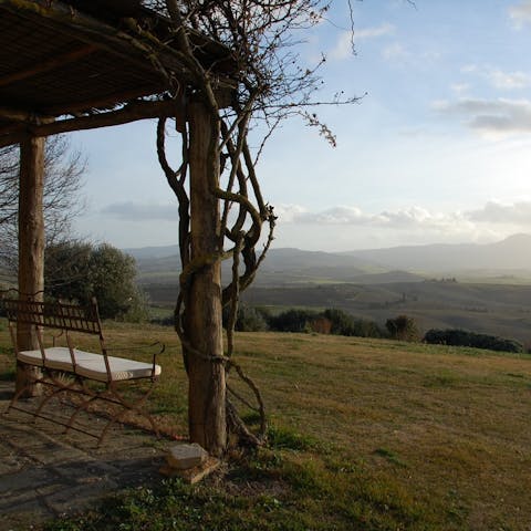 Admire sweeping views of the rolling hills from the beautiful garden