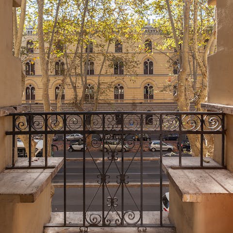Enjoy a glass of Italian wine on the balcony