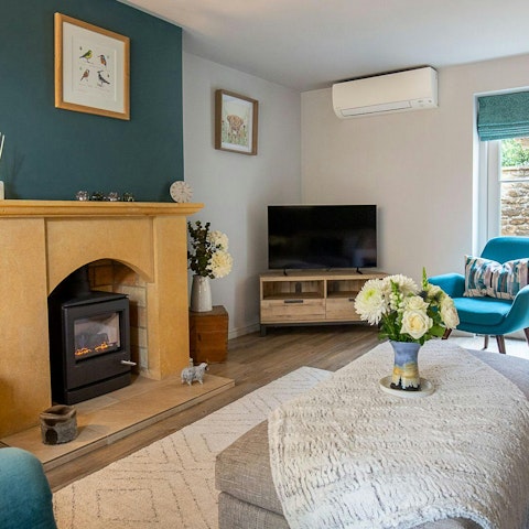 Cosy up by the fire after long walks in the Cotswold's countryside