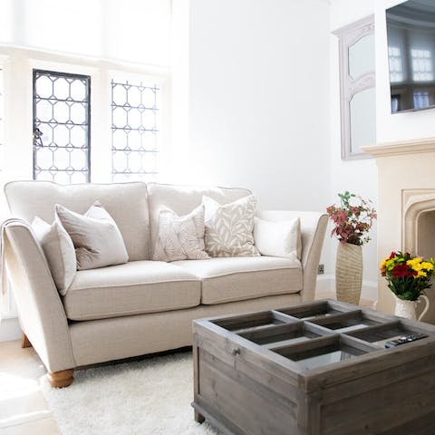 Get cosy in the bright and traditional living room