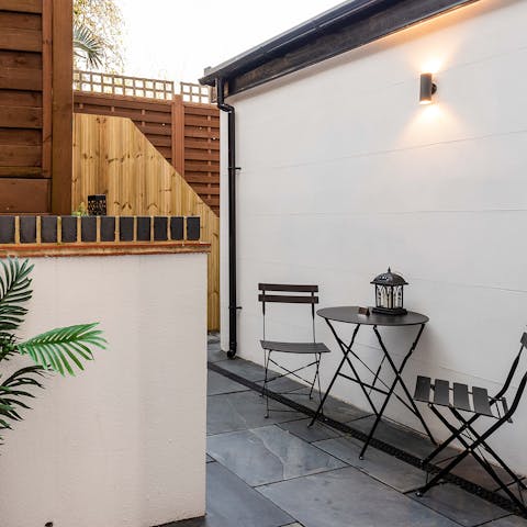Enjoy pre-dinner drinks on your private patio