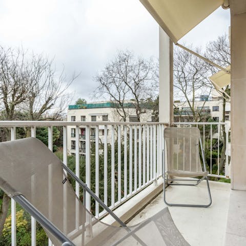 Get a breath of fresh air out on the apartment's balconies