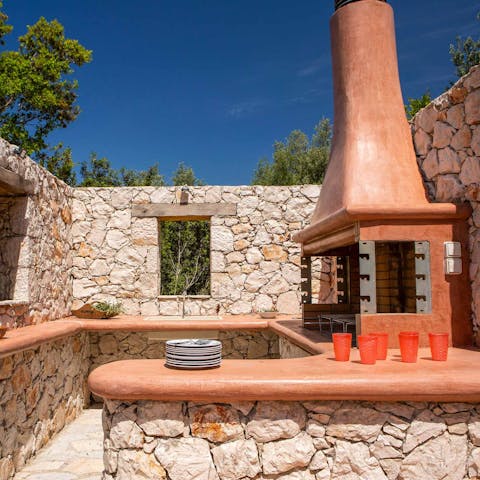 Get creative and cook some of the local cuisine in the outdoor kitchen