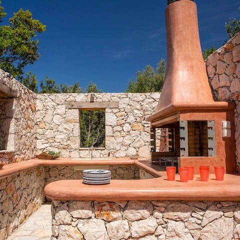 Get creative and cook some of the local cuisine in the outdoor kitchen