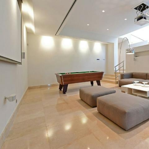 Settle down together for a movie night in the cinema room