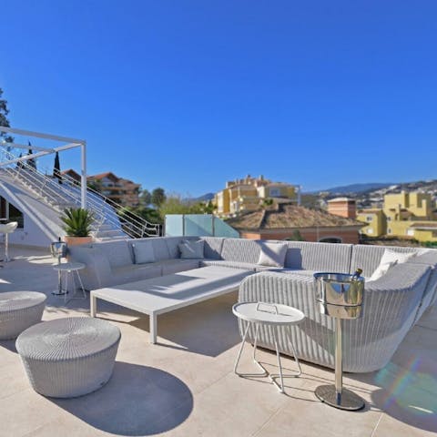 While away long summer days playing cards and reading books on the terrace