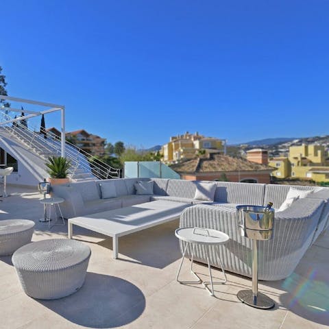 While away long summer days playing cards and reading books on the terrace