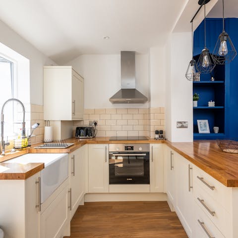 Whip up memorable meals in the modern country-style kitchen