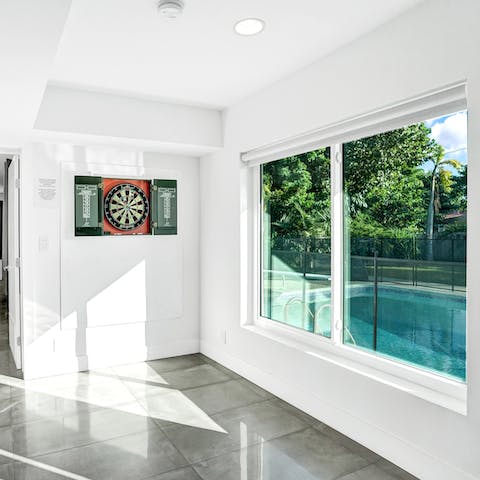 Brush up on your darts skills from the games room