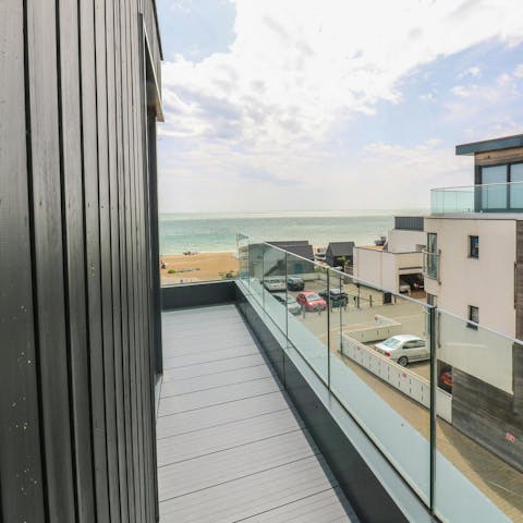 Take in the panoramic sea views from the wraparound balcony