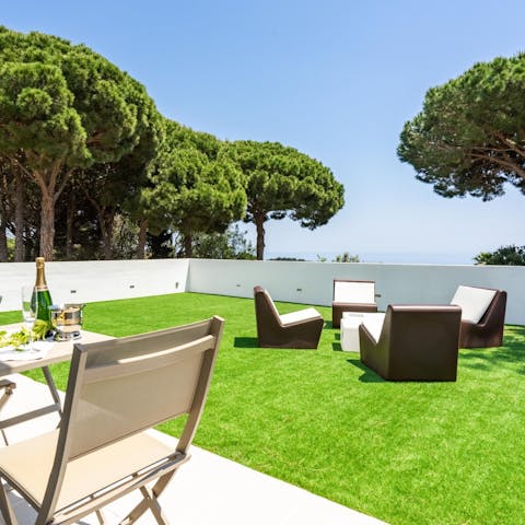 Enjoy a glass of Cava on the sea-facing balcony