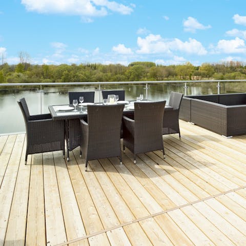 Take in picturesque views over Swillbrook Lake from the rooftop terrace