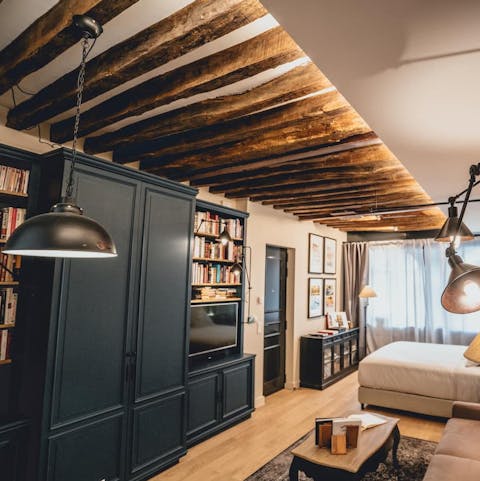Admire the striking exposed beams overhead
