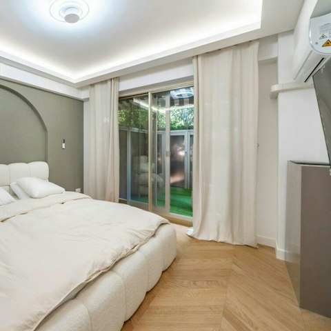 Catch the sun early with sliding doors in the bedroom