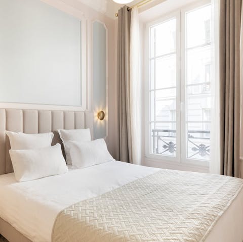 Open up the balcony doors for a coffee curled up in bed