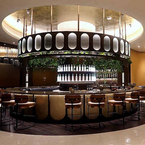 Pull up a chair at the on-site bar and order your favourite drink