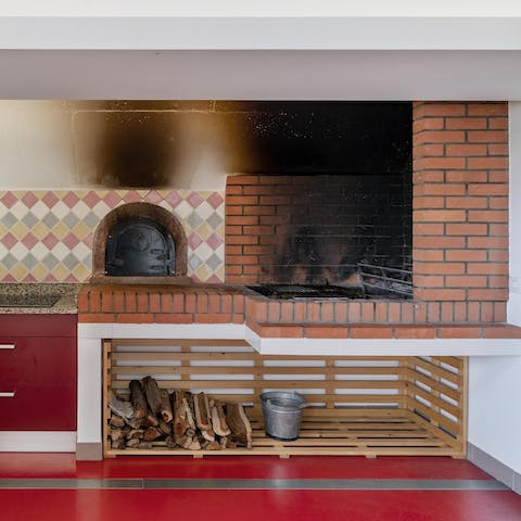 Flex your culinary muscles on the kitchen's brick barbecue