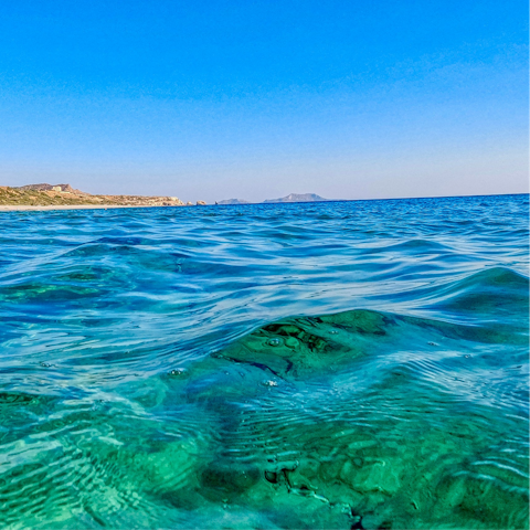 Swim in the warm Agean sea at nearby Ligaria Beach