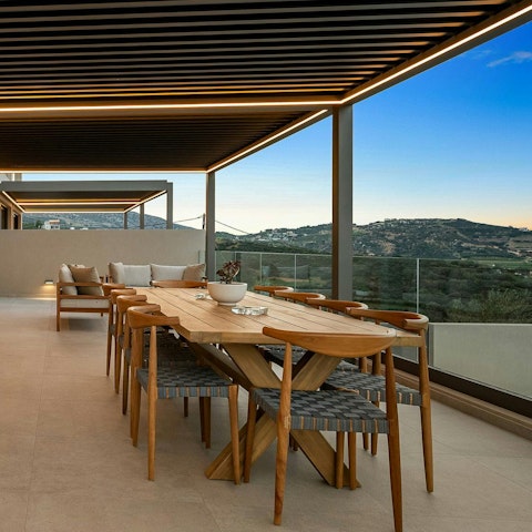 Gather together for dinner with a view at the outdoor dining table