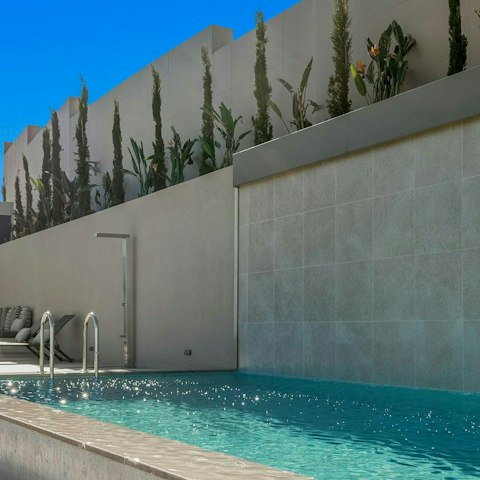 Cool off in one of the villa's two infinity pools