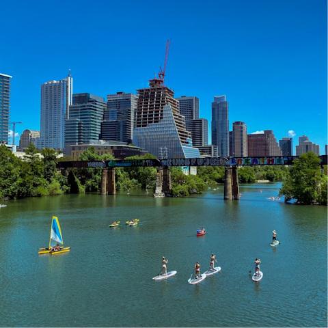 Spend the day at Lady Bird Lake, a ten-minute drive from this home