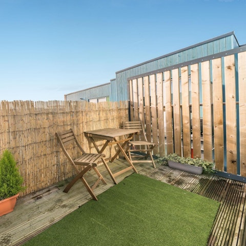 Sit out on the home's terrace and watch the sky change colour at sunset