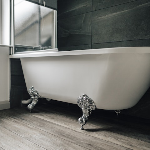 Tend to limbs sore from walking in the resplendent clawfoot bathtub