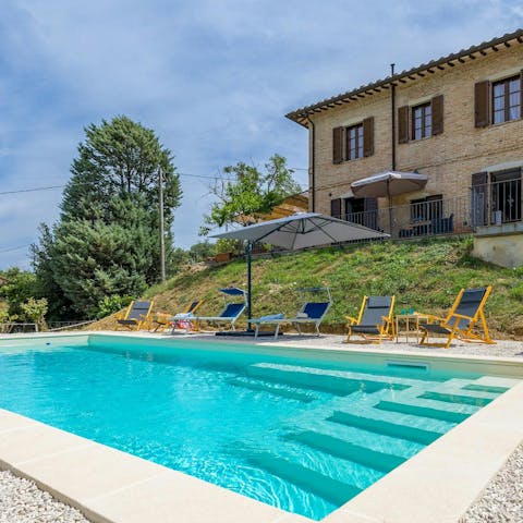 Unwind by the private pool on a sunny afternoon