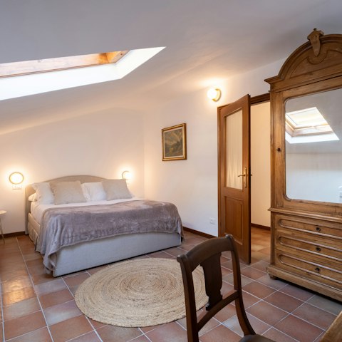 Drift off to sleep in the elegant bedroom