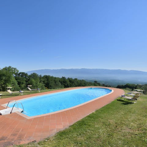 Soak up impressive views of the Arno Valley while making plans by the pool