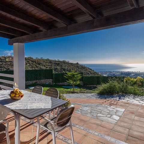 Enjoy an alfresco meal with stunning sea views
