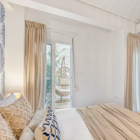 Enjoy your morning coffee in the sunny courtyard patio, accessed via the bedroom